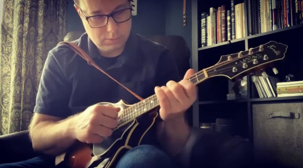 Playing the mandolin (probably not very well)
